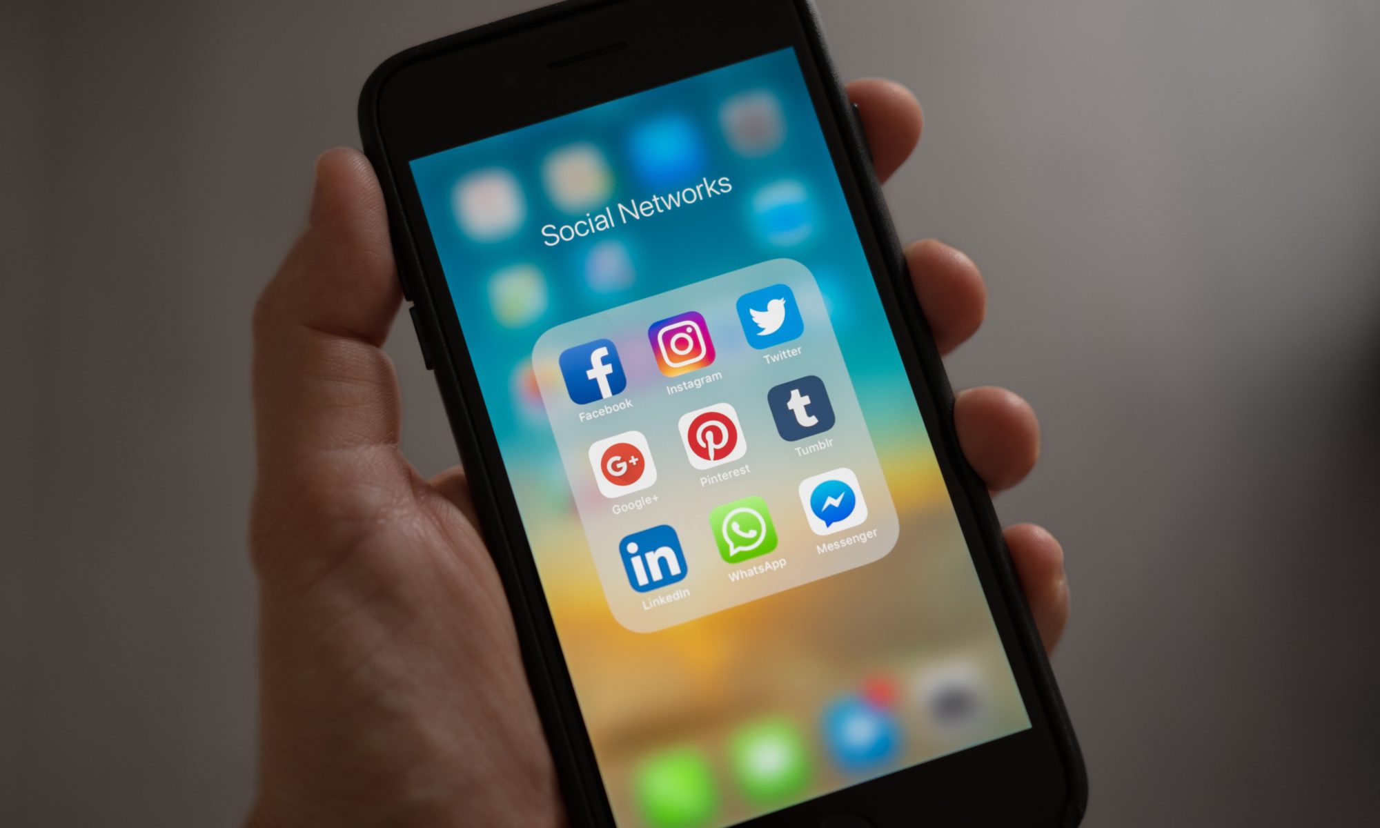 smartphone showing icons of various social media platforms - Suffolk copywriter - Suffolk copywriting